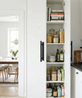 Six Pack Black ABS Plastic Peel And Stick Cabinet Handles on white kitchen cupboard door