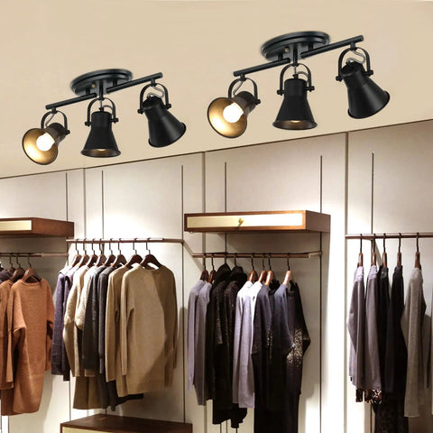 Three Light Black Track Lighting Kit With Rotatable Heads in a closet setting for industrial ceiling light application