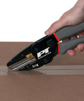 Three In One Power Cutting Tool That Works As A Wire Cutter, Box Cutter And Utility Knife being used to cut cardboard tape