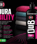 Super Soft Microfiber Detergent For Towels And Applicators 16oz Wash And Restore Formula That Removes Wax Polish And Grease Safe For Washing Machines Biodegradable Microfiber Cleaner For Rags And Pads bottle with stacked microfiber towels