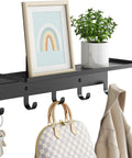Wall Mounted Shelf With Five Metal Hooks, 17 Inch Coat Rack Organizer in Black Finish with keys, bag, and coat displayed