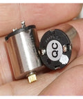12mm Coreless High Speed Magnetic Motor With Hall Encoder And Integrated Drive Board For Robotics in hand, close-up view