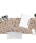 Leopard Print Large Gaming Mouse Pad For Home Office Desk Setup with keyboard and controller, 31.5 x 11.8 inch, non-slip rubber base.