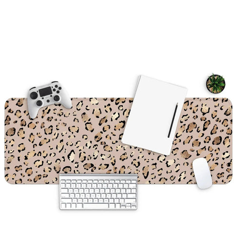 Leopard Print Large Gaming Mouse Pad For Home Office Desk Setup with keyboard and controller, 31.5 x 11.8 inch, non-slip rubber base.