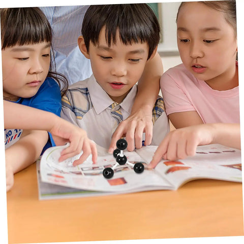 Children using Hands On Molecular Model Kit For Chemistry Education Classroom Science Teaching Tool Build Realistic Molecular Structures