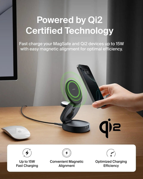 Person using MagSafe Ready 3 In 1 Qi2 15W Wireless Charger Station With Travel Stand And 36W Adapter on wooden desk.