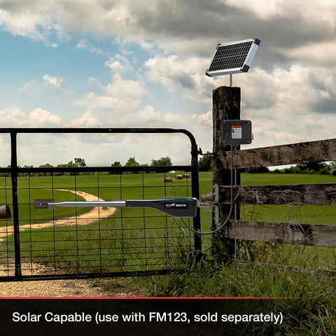 Game Changing Solar Automatic Gate Opener Designed For Heavy Duty Outdoor Chain Link And Wood Gates Up To Sixteen Feet With Slick Remote Controller Full System Kit installed on a fence.