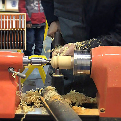 Woodworker using the Top Notch Eight Piece Wood Lathe Chisel Set Featuring Razor Sharp High Speed Steel Blades for turning wood.