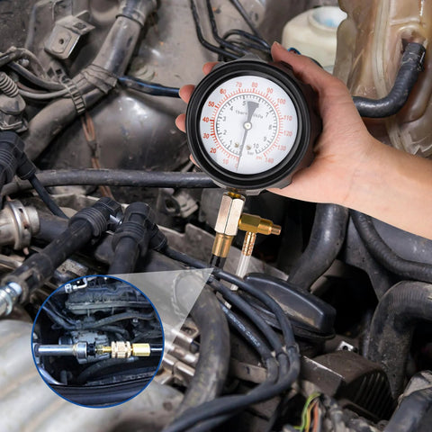 Jiimee 0-140 PSI fuel pressure tester gauge with brass adapters installed in a diesel engine fuel line