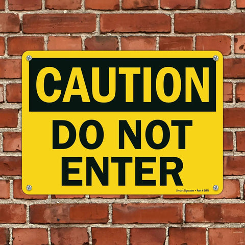 Heavy Duty Caution Do Not Enter Sign 10 X 14 Inches Thick Hdpe Plastic Safety Marker mounted on a brick wall.