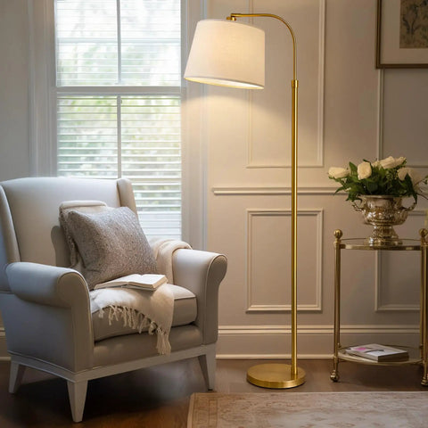 62 Inch Tall Arc Floor Lamp With Antique Brass Shade Lantern Industrial Gold Finish Mid Century Modern Reading Light next to armchair
