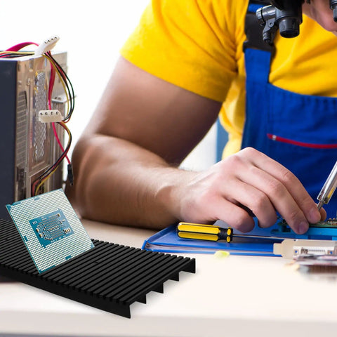 Anti Static Circuit Board Rack Tray For Electronics Projects Lightweight PCB Storage Holder Easy To Install Securely Holds Circuit Boards For Safe Maintenance And Quick Repairs shown holding a PCB securely next to a technician soldering.