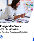 Woman examining printed materials on a table, showcasing the High Yield Black Ink Cartridge Delivers Crisp Text And Sharp Graphics Works Smoothly On Deskjet And Envy Printers Offers Bang For Your Buck Cranking Page After Page For Home Office Needs Backed By Real Reliability.