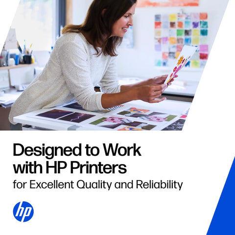 Woman analyzing printed photos on a table, showcasing Heavy Duty Black Printer Ink Cartridge Works As A Solid Workhorse Delivering Crisp Pages And Bold Text For Daily Hustle Or Weekend Tasks Compatible With Smooth Operating Envy Printers.