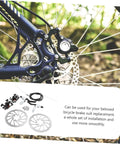 Top Shelf Mountain Bike Disc Brake Kit Featuring Robust Hydraulic Mechanical Calipers With Snappy Engagement And Rock Solid Coated Rotors For Reliable Trail Control close-up of brake caliper and rotor on a bike wheel.