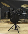 Heavy Duty Alloy Folding Drum Rack With Hinged Height Adjustment Quick Release Clamps Snare Bass Drum Holder in a music studio.