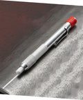 Soapstone Marking Pencil With Aluminum Holder For Welding Supplies laying on a metal surface with chalk marks visible