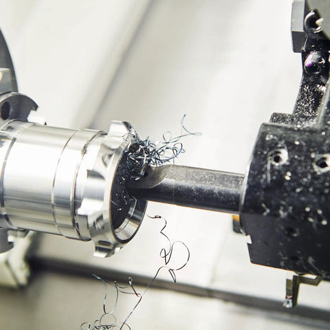 Close-up of 1/4 Inch Shank Lathe Indexable Boring Bar Tool Holder S07K-SCLCR06 in action, cutting material on lathe machine
