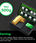 Tiny But Mighty Digital Pocket Gram Scale with 500 Gram Capacity and 0.01 Gram Precision displaying gold bars on LCD