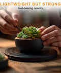 Person arranging succulents on 8 Inch Heavy Duty Turntable Stand With Non Slip Swivel Base And Steel Ball Bearings, 360 Rotation.