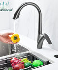 Garbage Disposal SinkTop Air Switch Kit With Matte Black Button and Stainless Steel Button shown near modern kitchen faucet