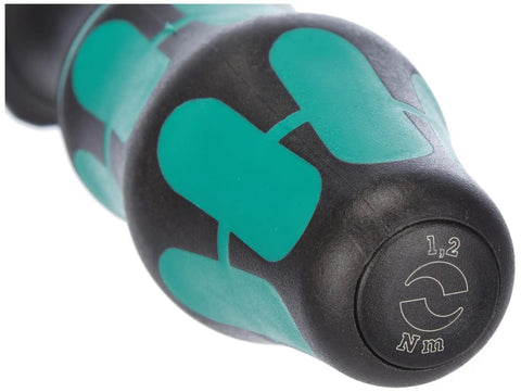 Close-up of handle details on Kraftform 7461 Hex Torque Screwdriver With Adjustable Pre-Set 1.2 To 3.0 Nm, green and black design.