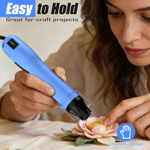 Woman using Dual Temp Heat Gun 330W Fast Heat 250C 350C Hot Air Tool With Overload Protection Reflector Nozzle for crafting