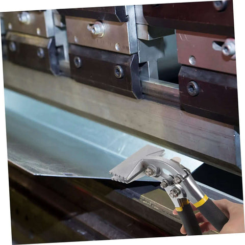 Manual Metal Bender Tool With Straight Jaw Hand Seamer in use for duct crimping, showing its grip on metal sheet in an industrial setting.