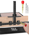 Heavy Duty Aluminum Alloy Cabinet Hardware Jig Kit With Auto Center Punch And Precision Drill Guide For Dead On Drawer Handle Mounting No Sweat Zero Shake Setup with measuring ruler and punch tool in use.
