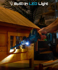 SEESII cordless reciprocating saw side view with LED light cutting wood; teal body and two 4.0Ah batteries attached.