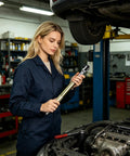 Mechanic using Extension Wrench Set High Torque Half Inch Metal Socket Tool System in automotive engine compartment.