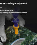 Water cooling equipment with Vientiane drip pipe for easy cutting of jade, beeswax, and amber on stone.