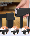 Close-up of hand using wide fit baby gate for stairs and doorways auto close fits 29.93 to 46 inch openings 30 inch tall