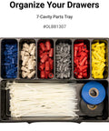 Close-up of a 7-cavity parts tray with colorful connectors, cable ties, and blue tape, labeled for organization.