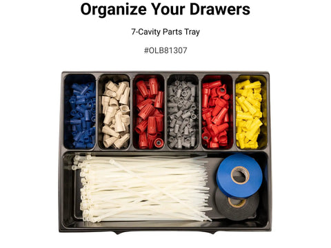 Close-up of a 7-cavity parts tray with colorful connectors, cable ties, and blue tape, labeled for organization.