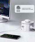 Hassle Free Slick Pop Up Outlet With Wireless Charging Pad And Fast 65W Usb Port 4 Point 7 Inch 20 Amp GfcI Countertop Mount in white on desk.