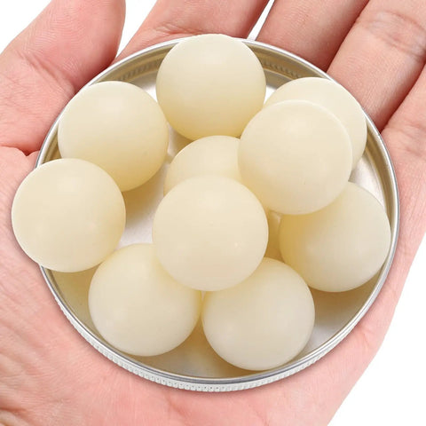 Twenty Pack Nylon Bearing Balls One Inch Diameter Solid Plastic Sphere Precision Engineering Grade in a hand.