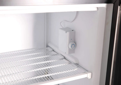 A Top Shelf 3 Cubic Foot Midi Upright Freezer In Stainless Steel With Reversible Door And Adjustable Feet For Basements Or Break Rooms This Sweet Space Saver Delivers Zero Fuss Setup And Drops Heavy Chill Wherever You Park It Today interior view showcasing adjustable shelves and temperature control.
