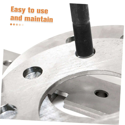 Close-up of Manual Hole Knockout Puncher Tool Kit With Hydraulic Punch Driver and Dies punching through metal sheet