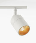 Close-up of single fixture from Four Light White Track Light Kit With Adjustable Heads Integrated LED Bulbs Three-Foot Track Ceiling Mount