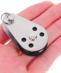 Beefy Stainless Steel Marine Pulley Kit For Kayaks And Canoes held in hand, heavy duty load bearing boat hardware