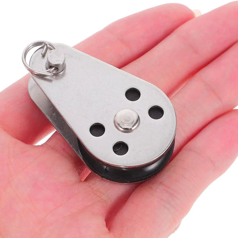 Beefy Stainless Steel Marine Pulley Kit For Kayaks And Canoes held in hand, heavy duty load bearing boat hardware