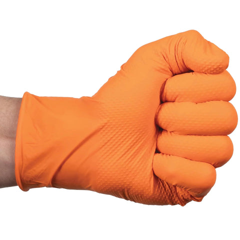 Orange nitrile glove with raised diamond grip on a gloved hand; close-up