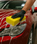 Two Pack Extra Thick Large Rectangle Car Wash Sponges For All Purpose Cleaning Non Scratch Safe On Paint Ideal For Vehicle Washing Equipment Cleaning And Boat Cleaning on red car hood