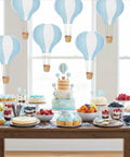 Blue White 6 Pack Hanging Hot Air Balloon Paper Lanterns Set for DIY Wedding Decor above dessert table setup.