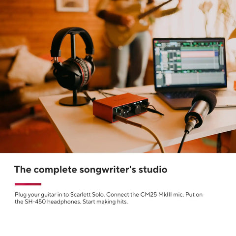 Scarlett Solo Studio 4th Gen USB Audio Interface Bundle With Condenser Microphone And Studio Headphones on a table setup
