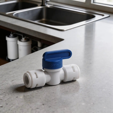 5 Piece 3/8 Inch Quick Connect Shut Off Ball Valve Push Fit Polypropylene Connector For Water Filter Lines on a kitchen counter.