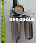 Heavy Duty High Flow Three Quarter Inch Combo Filter Regulator Lubricator With Gauge For Compressed Air Three Quarter Inch Female NPT Inlet And Outlet 250 PSI Max Input 215 PSI Max Output Built Tough For Busy Shops.