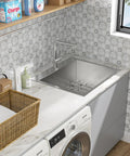Installed drop-in laundry sink, 304 stainless steel, 16-gauge, 25x22x12 in, single bowl.