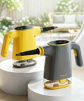 Entalva Handheld Steam Cleaner Gray With Smart Led Display And 15 Pieces Cleaning Kit on display next to a yellow variant.